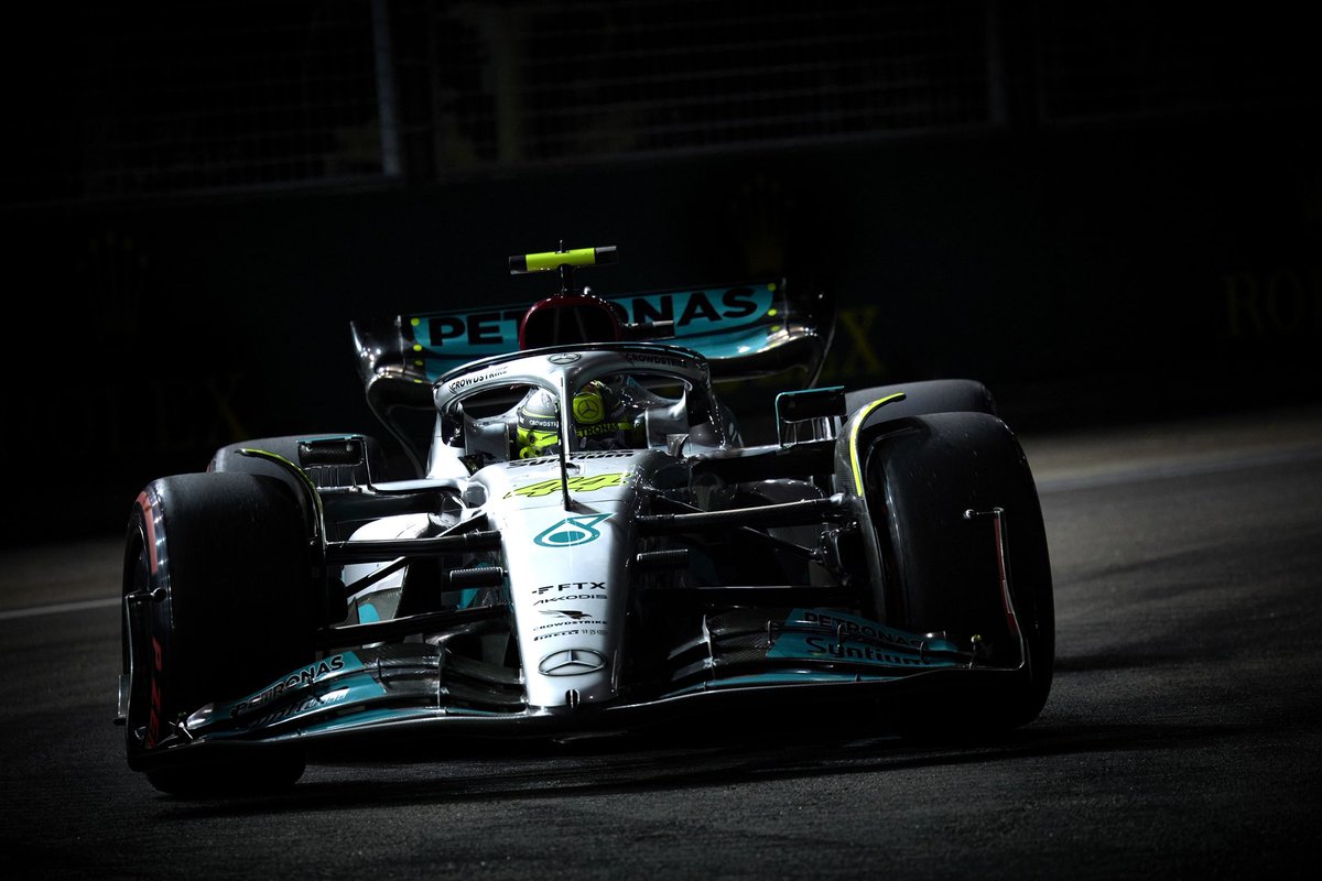 Lewis goes down the inside. Couldn’t make it stick and runs wide. Down to P9.