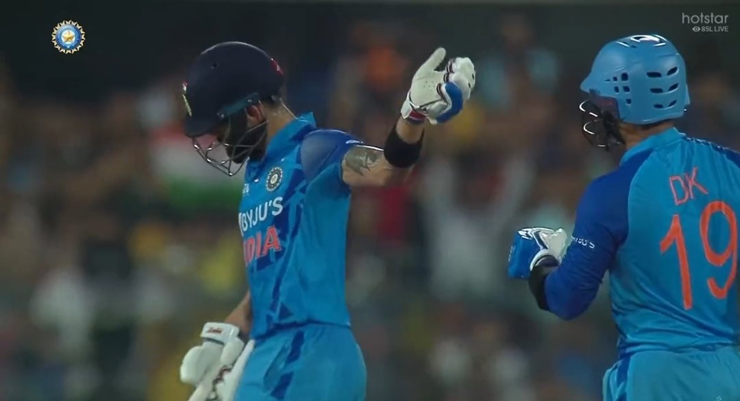 CricCrazyJohns's tweet photo. Virat Kohli asking Dinesh Karthik to continue the carnage, selfless as always. https://t.co/micZcemStd
