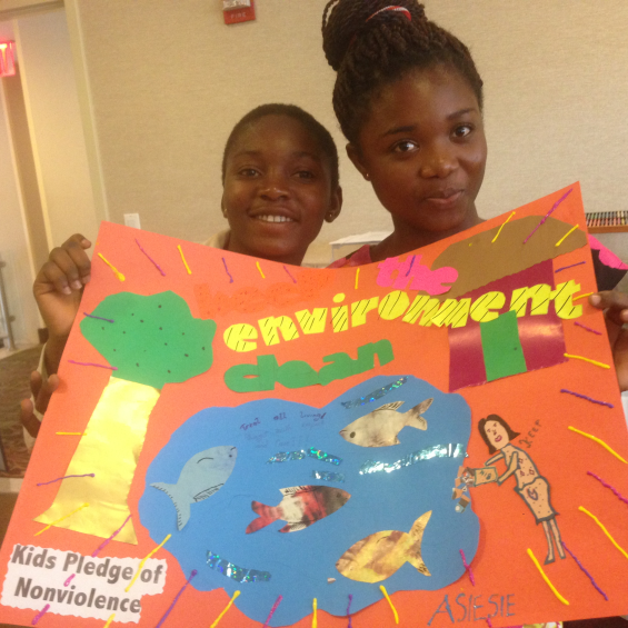 KenzMorri's tweet photo. This picture perfectly showcases a Social Reconstruction classroom. These students are creating posters in their classrooms to promote keeping the Earth clean. #educ200 #01fa22 https://t.co/HXlRSVH0gz