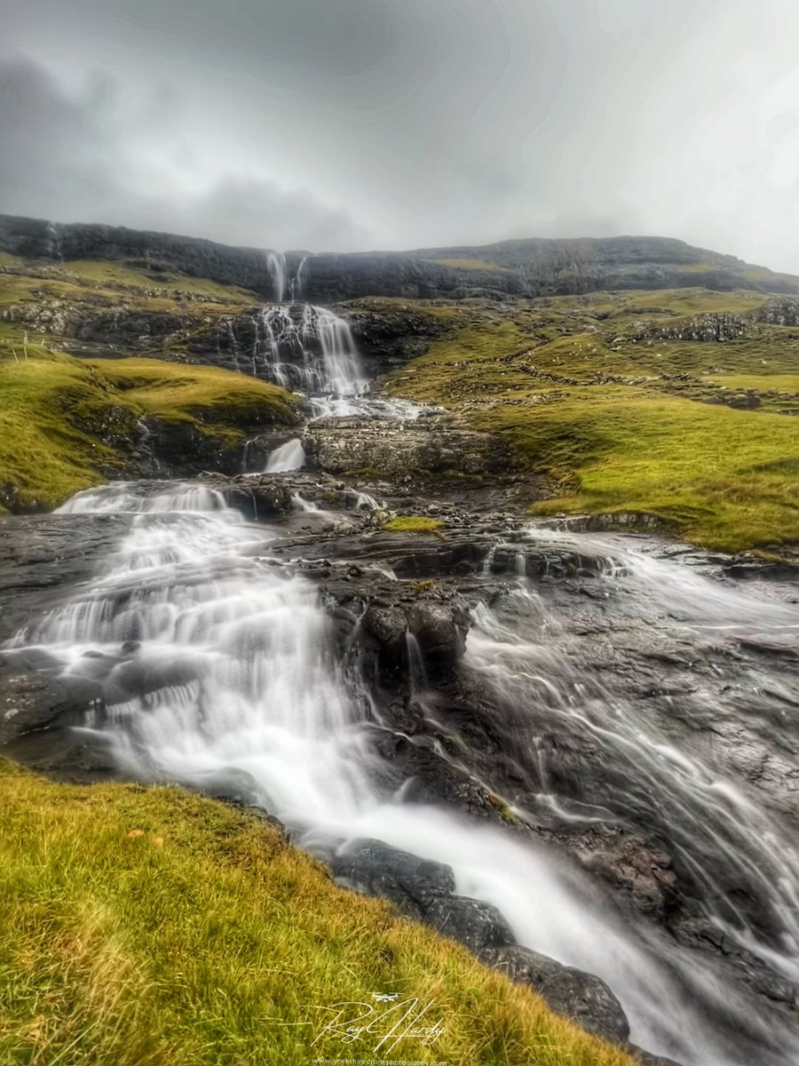 HolmfirthPhoto1's tweet photo. Once I watched a waterfall
Wash all my fears away
And then I thought I saw some
Happy tears of yesterday.
The moment brought aromas
Of the ocean and the sea
I lost my taste to reminisce
And started feeling free.
#waterfall #waterfalls @VisitFaroe @guidetofaroe @faroe_islands https://t.co/DnOD5IS633