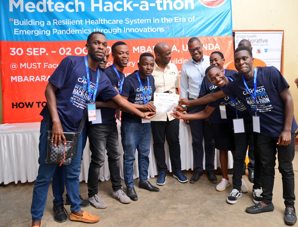 CamtechUganda's tweet photo. AND the winner for the 8TH CAMTech Uganda MedTech Hack-a-thon is 📢🔊 TEAM "SUKALI CARE."💃🏄🏂🎻🎺🎷

Felicitations are in order as team walks away with UGX 3.5M prize money. 

#HealthCareHack2022 https://t.co/96DlMeYmOw