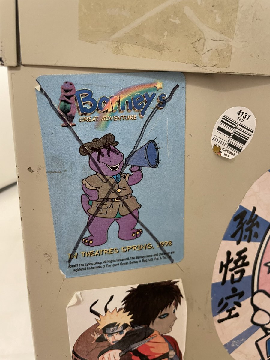 MisEleanorGrace's tweet photo. In honor of the Barney docuseries coming out soon, here is a photo of one of the stickers on the file cabinet at my work that looks like it came out of a  late 90s-late 00s childhood room. https://t.co/avaun5fW5V