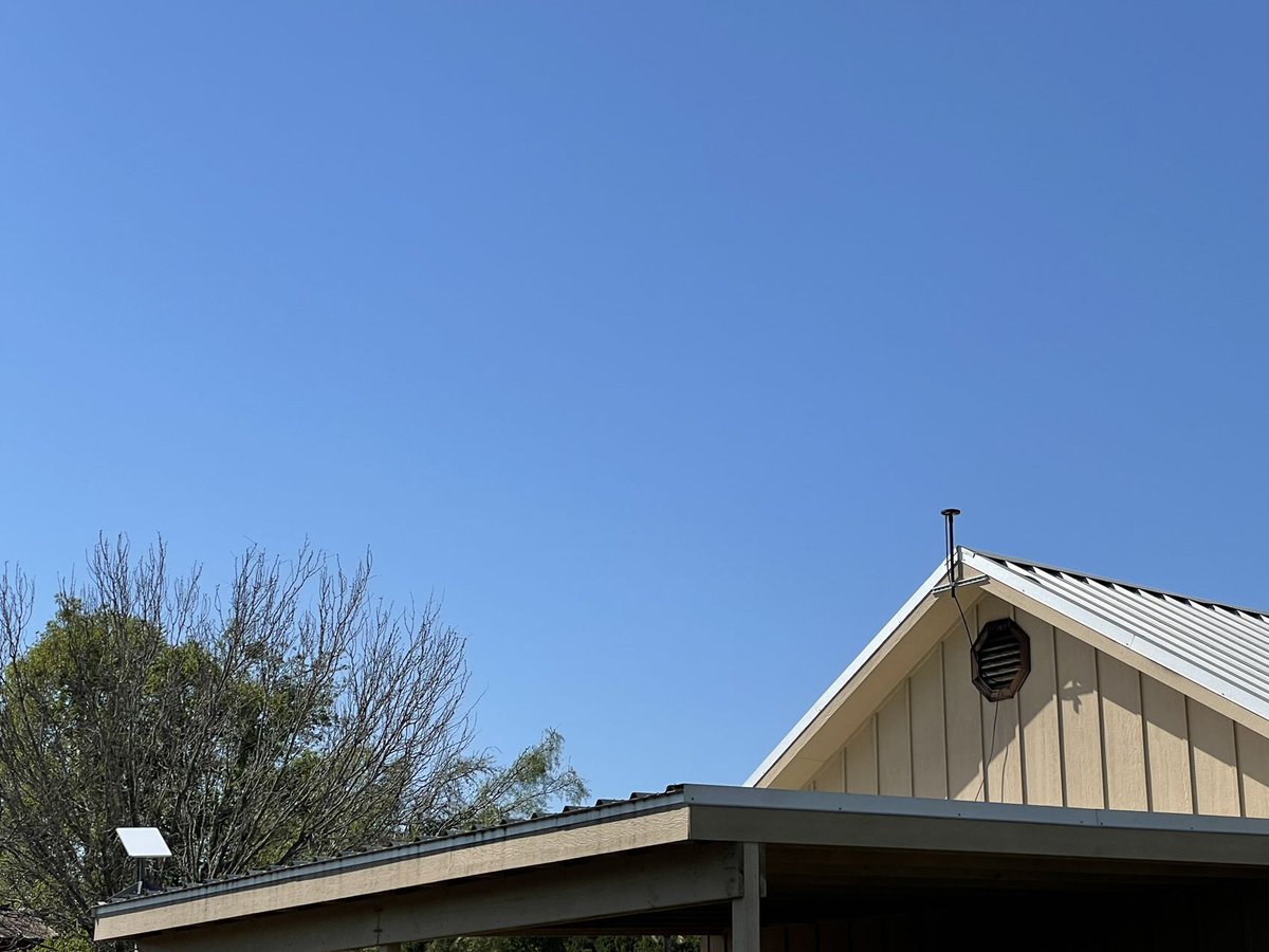 GEODNET's tweet photo. Last week the Geodnet team installed a new global station (G036)  connected via SpaceX's Starlink Low-Earth Orbit Satellite system as  shown.  
The picture shows the Geodnet antennae is at the roof apex for  best sky view, https://t.co/RjRi8TWAPn