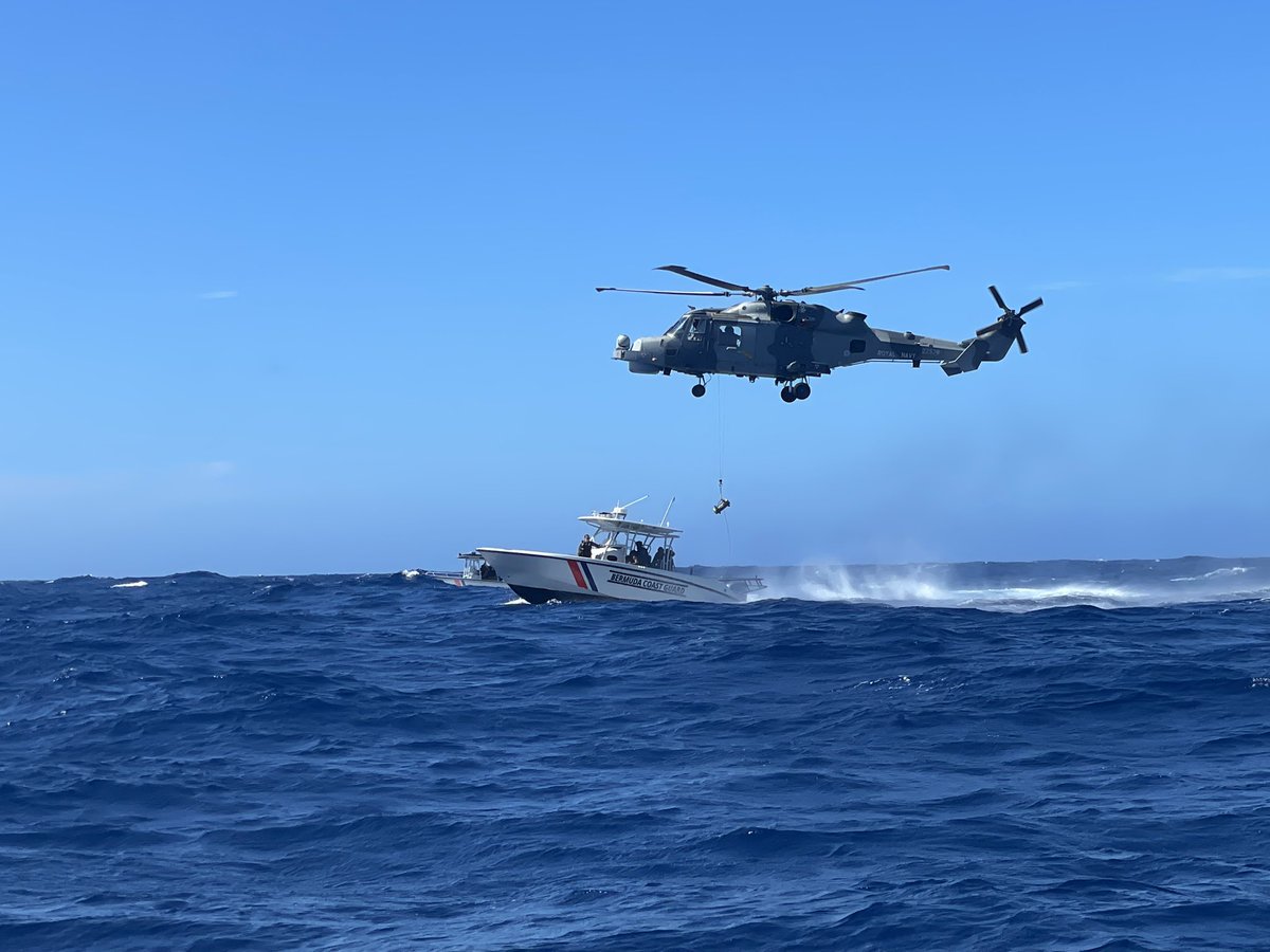 RFATideforce's tweet photo. MENACE 20 Winching Training Exercise with the Royal Bermuda Regiment Coast Guard. Weighted bag first followed by the Winchman - Straight down and back up. Keep that course steady, it’s a bit choppy out here today 🚁 🌊 @RFAHeadquarters @815NAS @RNASyeovilton https://t.co/YvSMHBJ7hE