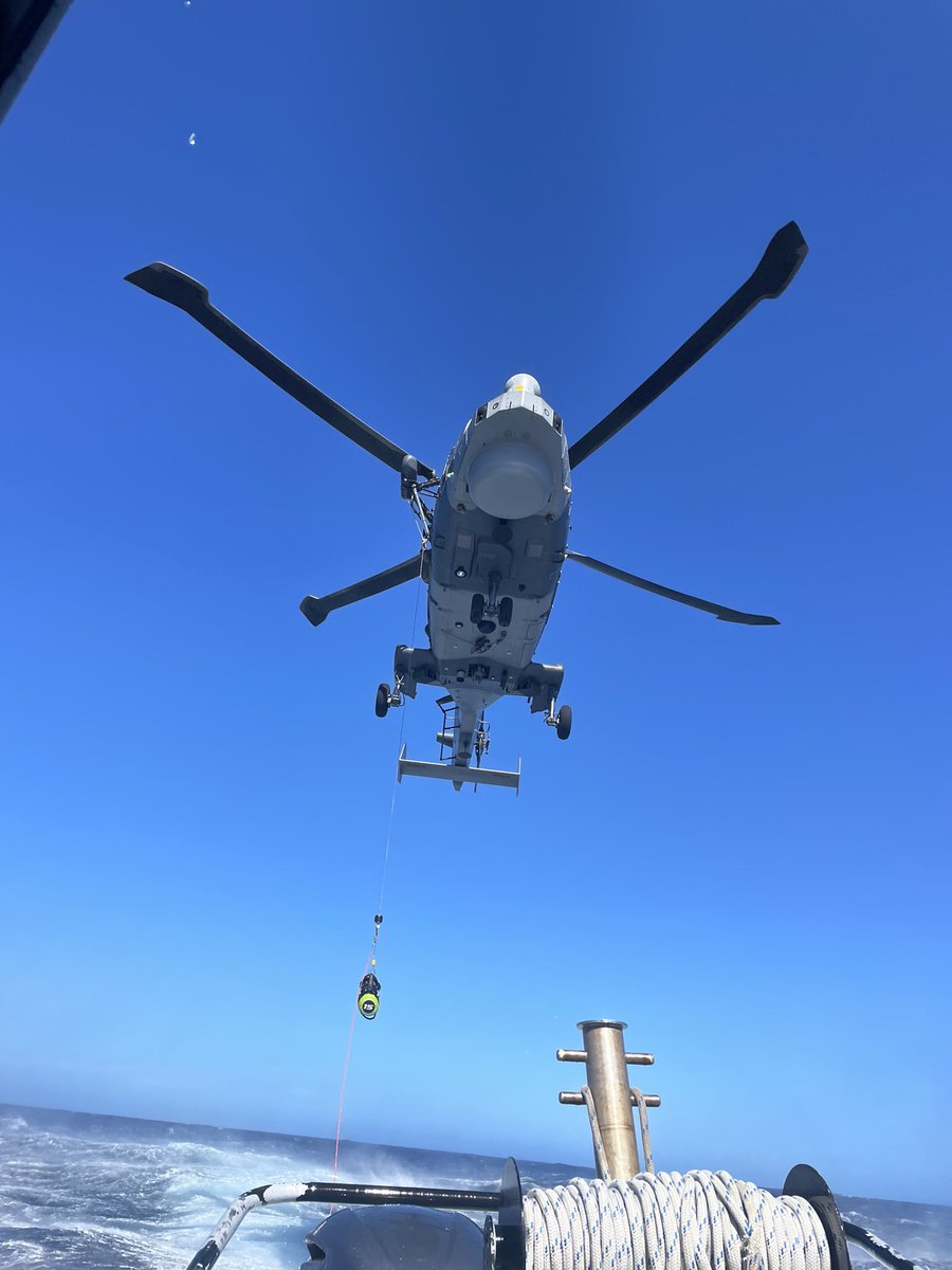 RFATideforce's tweet photo. MENACE 20 Winching Training Exercise with the Royal Bermuda Regiment Coast Guard. Weighted bag first followed by the Winchman - Straight down and back up. Keep that course steady, it’s a bit choppy out here today 🚁 🌊 @RFAHeadquarters @815NAS @RNASyeovilton https://t.co/YvSMHBJ7hE