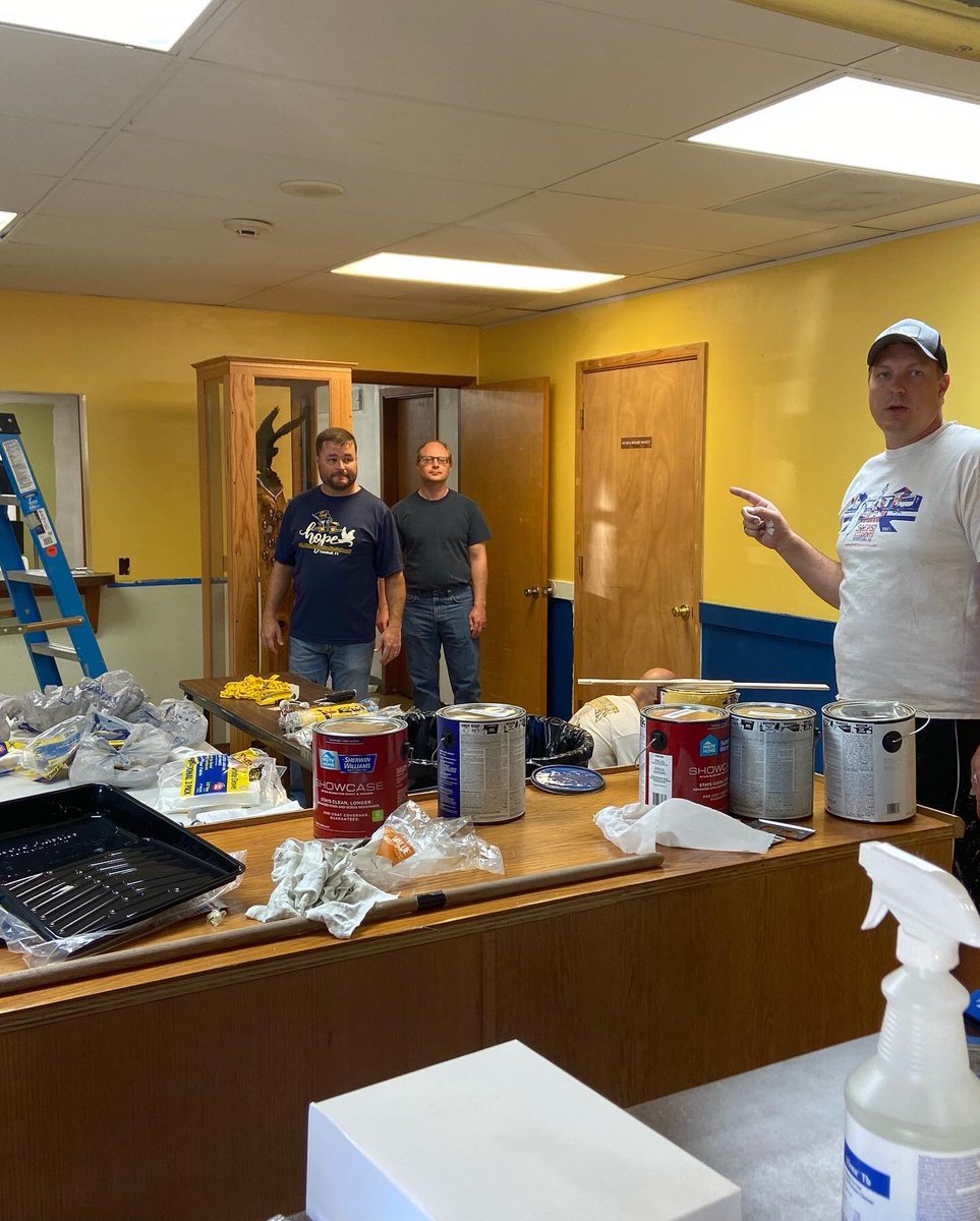 Our Dad’s Club sprucing up our concession stand!