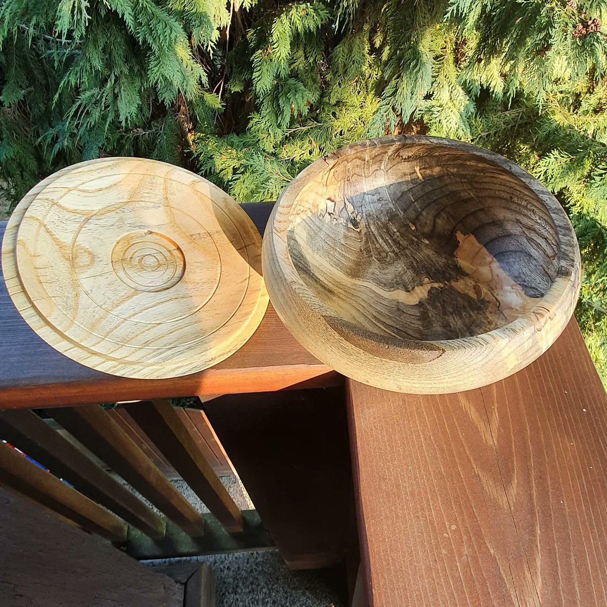 Today's efforts in the workshop.  I'm not quite satisfied with it yet. The contrast between the lid and the bowl is a bit jarring even though I used the same kind of wood for both. I'm thinking maybe airbrushing the lid to something darker would help.