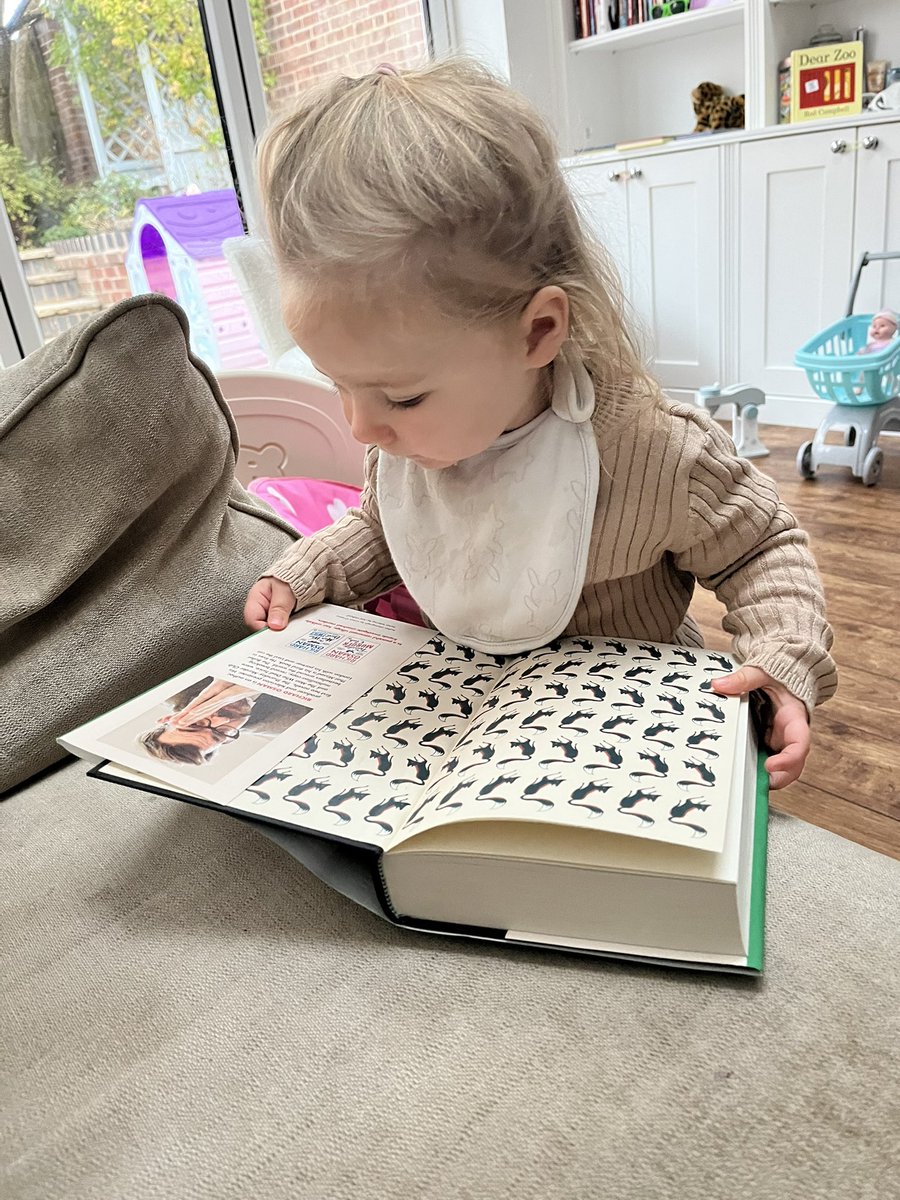 I feel this may be @richardosman’s youngest reader. #thursdaymurderclub #TheBulletThatMissed She will not leave this book alone!