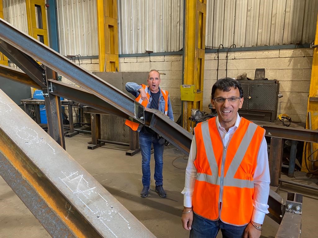 Structural_Fabs's tweet photo. Not very often you see Kevin McLeod speechless! He's clearly in awe of Suj Kang, @Structural_Fabs very own Man of Steel or could it be the 'Super' steelwork we created for the latest episode of Grand Designs? Catch up now on All 4  https://t.co/kIhLftTmXb https://t.co/GIj7W4mYQF