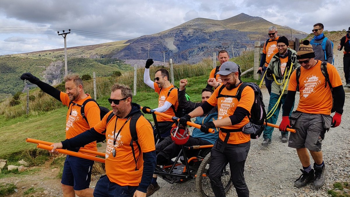 backuptrust's tweet photo. On Sept 17th, our incredible #BackUpSnowdonPush participants made their way up Mount Snowdon.

Their aim? To raise funds to support those affected by #SpinalCordInjury 🧡

They raised a brilliant £33,000 for our life changing services, allowing us to continue our vital work 🎉 https://t.co/LG2qYprOmF