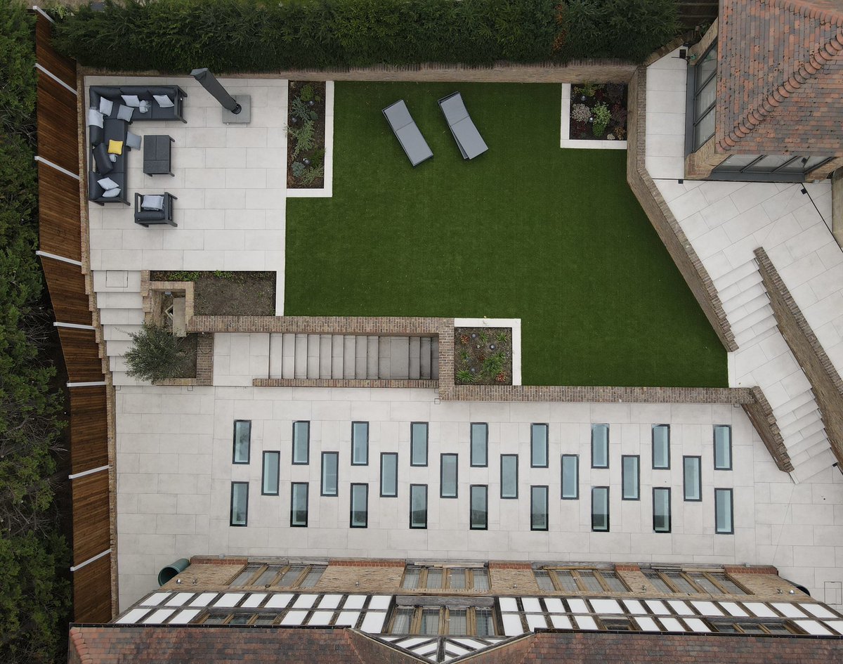 Porcelain patio installed by Paramount paving using @MarshallsGroup Motus porcelain 900x600 slabs in the colour cream #patio #porcelain #bromley #orpington #kent