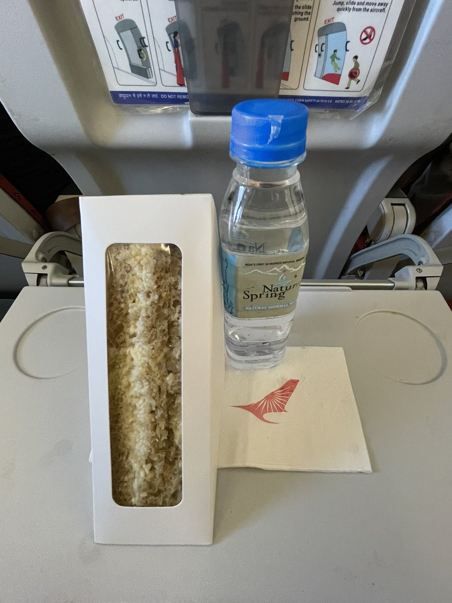 SinhaVaruni's tweet image. So I got this Cheese-free, Meat-free, Dairy-free, Veggie-less “Veg” Sandwich on my @airindiain flight today. No caffeine or sugar in beverage too! :O
#airindiameal #airindia #leanmachine