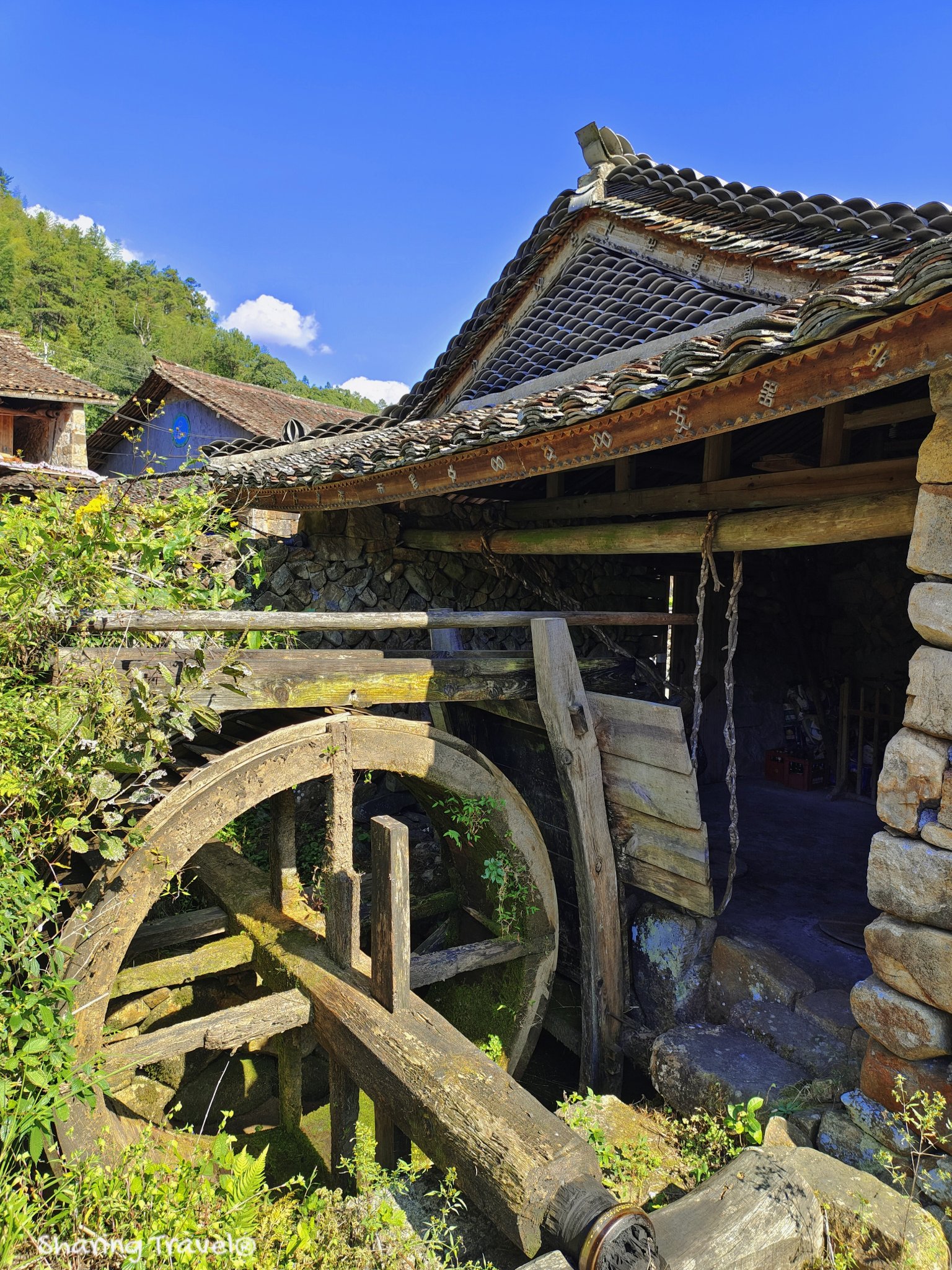 Sharing travel on Twitter: “My hometown, the traditional waterwheel