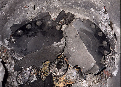Want to know what scientists worry about?  Centrifuges.

1999 incident at MIT where an ultra-centrifuge was properly loaded, brought up to 55,000 rpm, and sometime during the run, the 20 lb titanium alloy block split in half and hit the inner walls going 1000 km/hr.