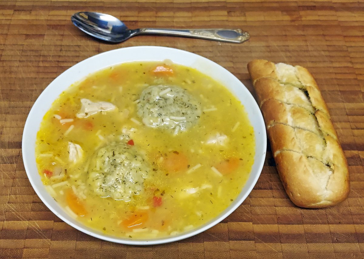 painterley's tweet image. Jewish chicken soup with Matzoballs and crusty bread.