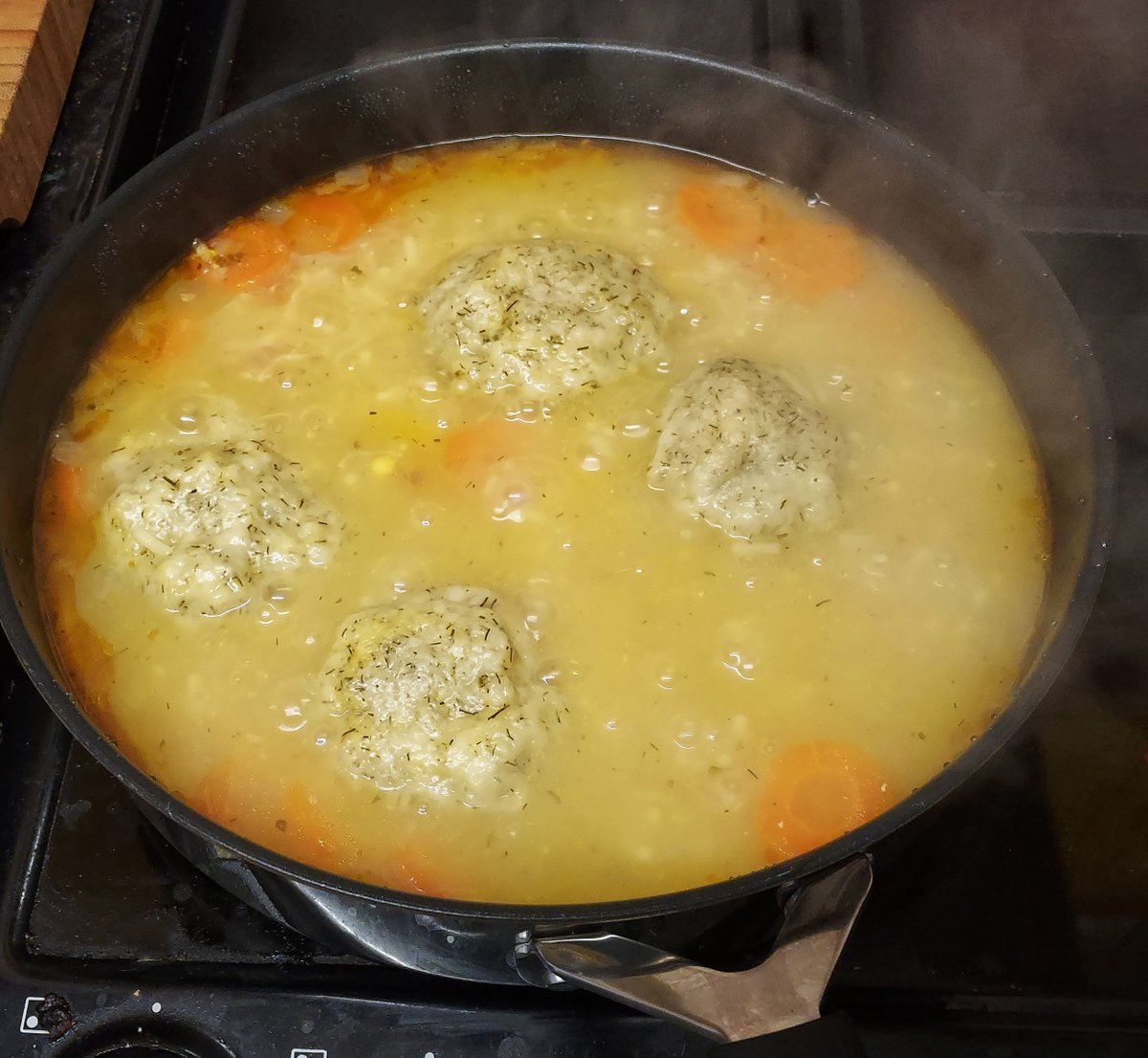 painterley's tweet image. Jewish chicken soup with Matzoballs and crusty bread.