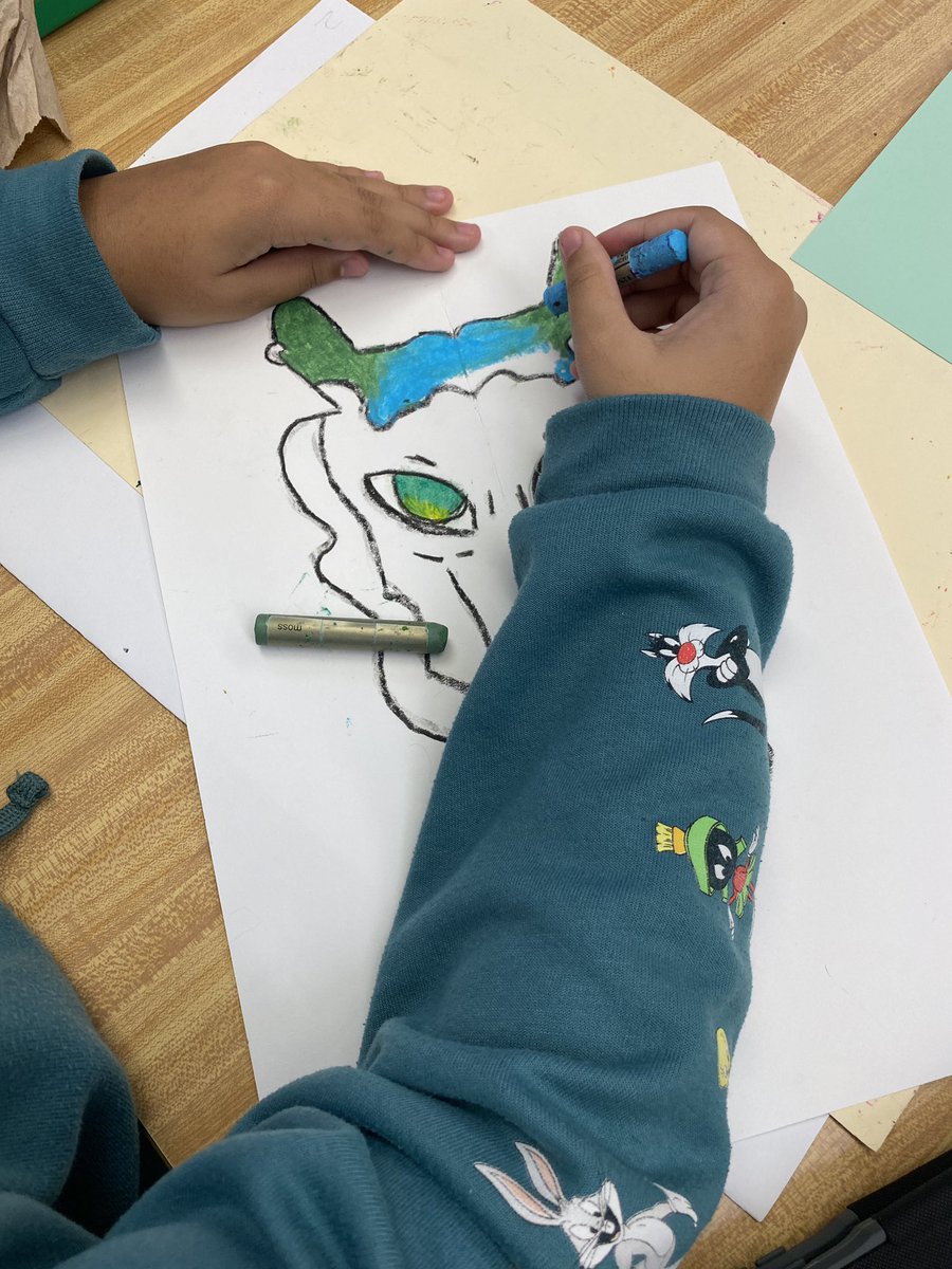 Learning a transfer process during their symmetry lesson so they don’t have to draw the other side by hand!