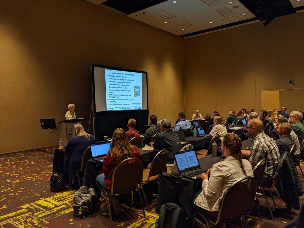URISAVC's tweet photo. Look at these future leaders in the #GIS  Program Management class taught by Steve @steinbergspace and author of The #GISManagement Handbook - Pete Croswell
#gispro2022 https://t.co/JFmeA7di4y