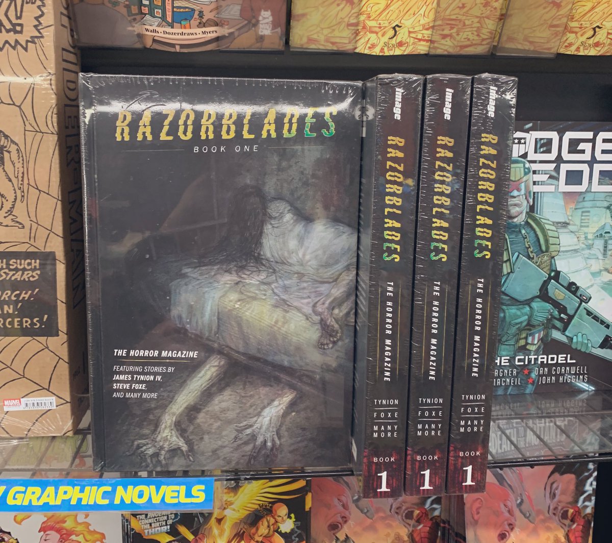 Is it truly October if you’re not reading something scary? Pick up your copy of RAZORBLADES: THE HORROR MAGAZINE Book One Deluxe HC now! Spotted here last month at @MidtownComics Times Square 👻