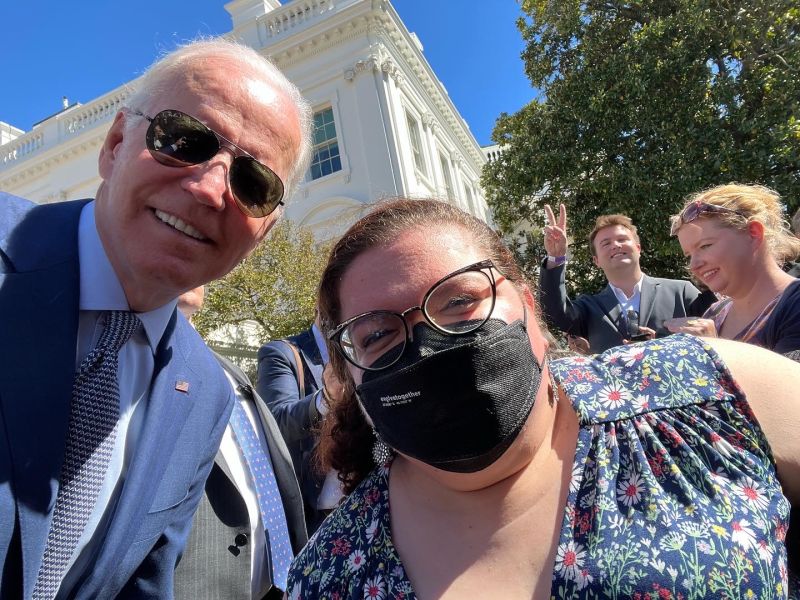 AdelphiUMag's tweet image. What did you do last weekend? Emily Ladau '13 was at the White House to celebrate the 32nd anniversary of the Americans with Disabilities Act--and having a selfie taken by and with President Biden. bit.ly/3fEc3DN