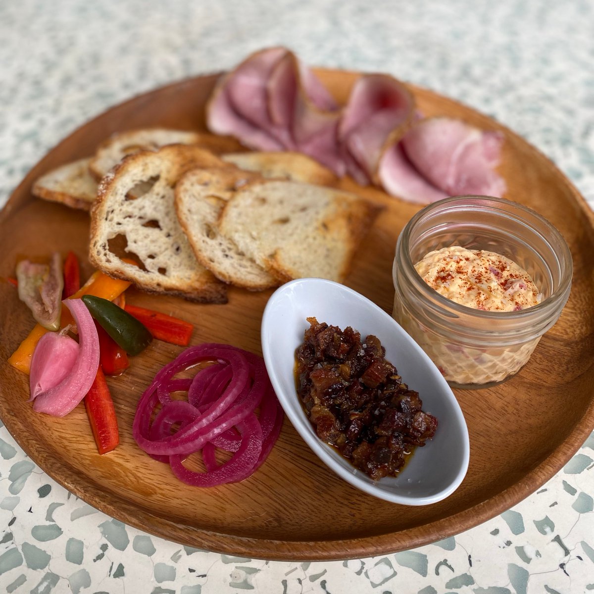 Guess what's back?!

Consider this your #MondayMotivation ! Stop in and enjoy our Pimento Cheese + Heritage Ham complete with house pimento cheese, berkshire smoked ham, bacon jam, pickled red onion, house pickles, mustard, + crostini. ⁠#Trova