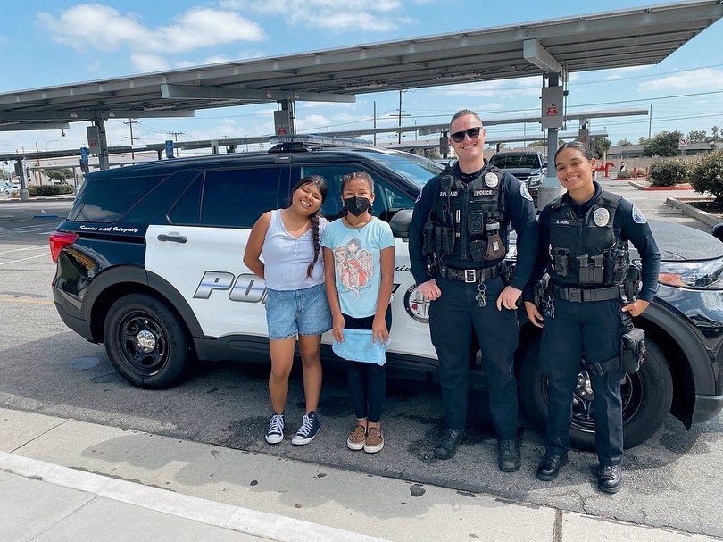 WestminsterPDCA's tweet photo. Over the weekend, Warner Middle School held a car wash for their cheer squad. Officer Foland and Officer Mora were happy to stop by to show their support for these amazing students! ๐ #WPD47 https://t.co/lExzShIP15