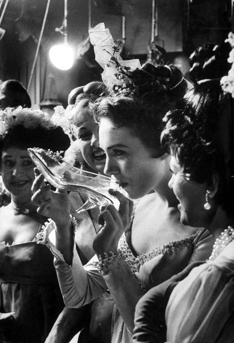 kevinddaly's tweet photo. Julie Andrews, aka Good Cinderella, sips champagne out of a glass slipper after the triumphant live broadcast of the Rodgers &amp; Hammerstein television musical on March 31, 1957, as Alice Ghostley, Edie Adams, and Kaye Ballard look on. https://t.co/wFJHIxhR8x