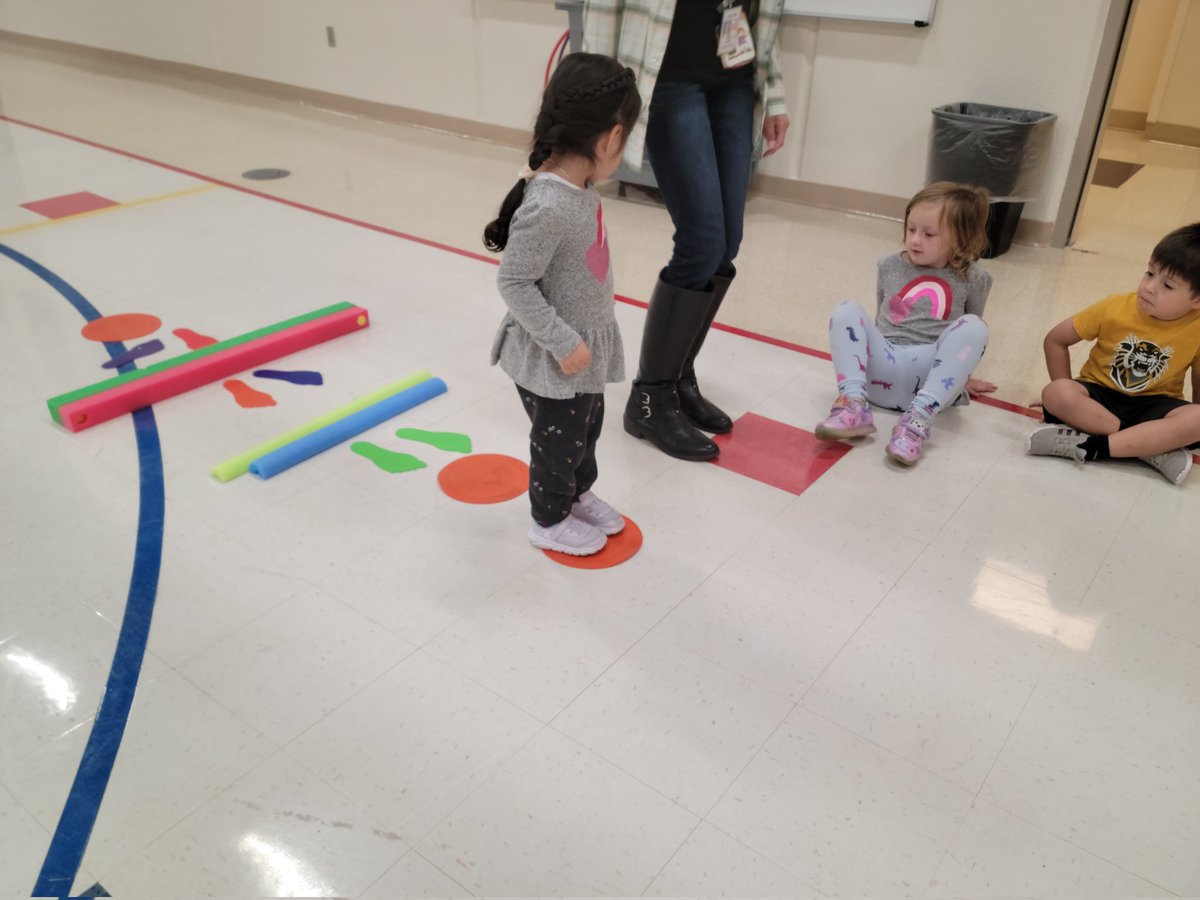 Today during gross motor groups, we practiced jumping forward with two feet landing, rolling a ball to a partner, and using scooters.