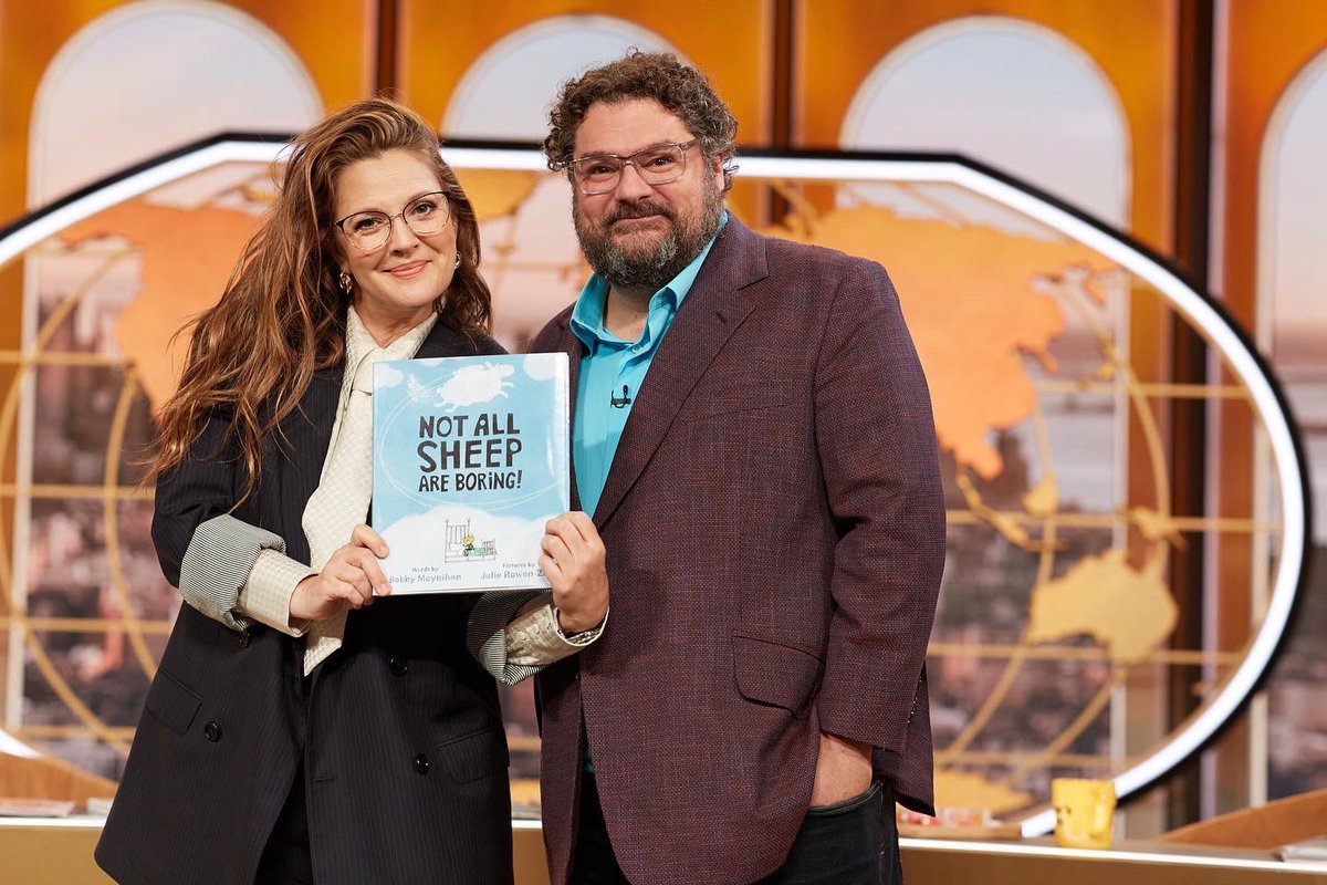 bibbymoynihan's tweet photo. Check out @DrewBarrymoreTV tomorrow October 4th! Drew was kind enough to let this little weirdy sit in on the news. Thanks Drew ❤️

#notallsheepareboring
🐑🐸🐑

@JulieRowanZoch 
@penguinkids https://t.co/UQCrgCG35q