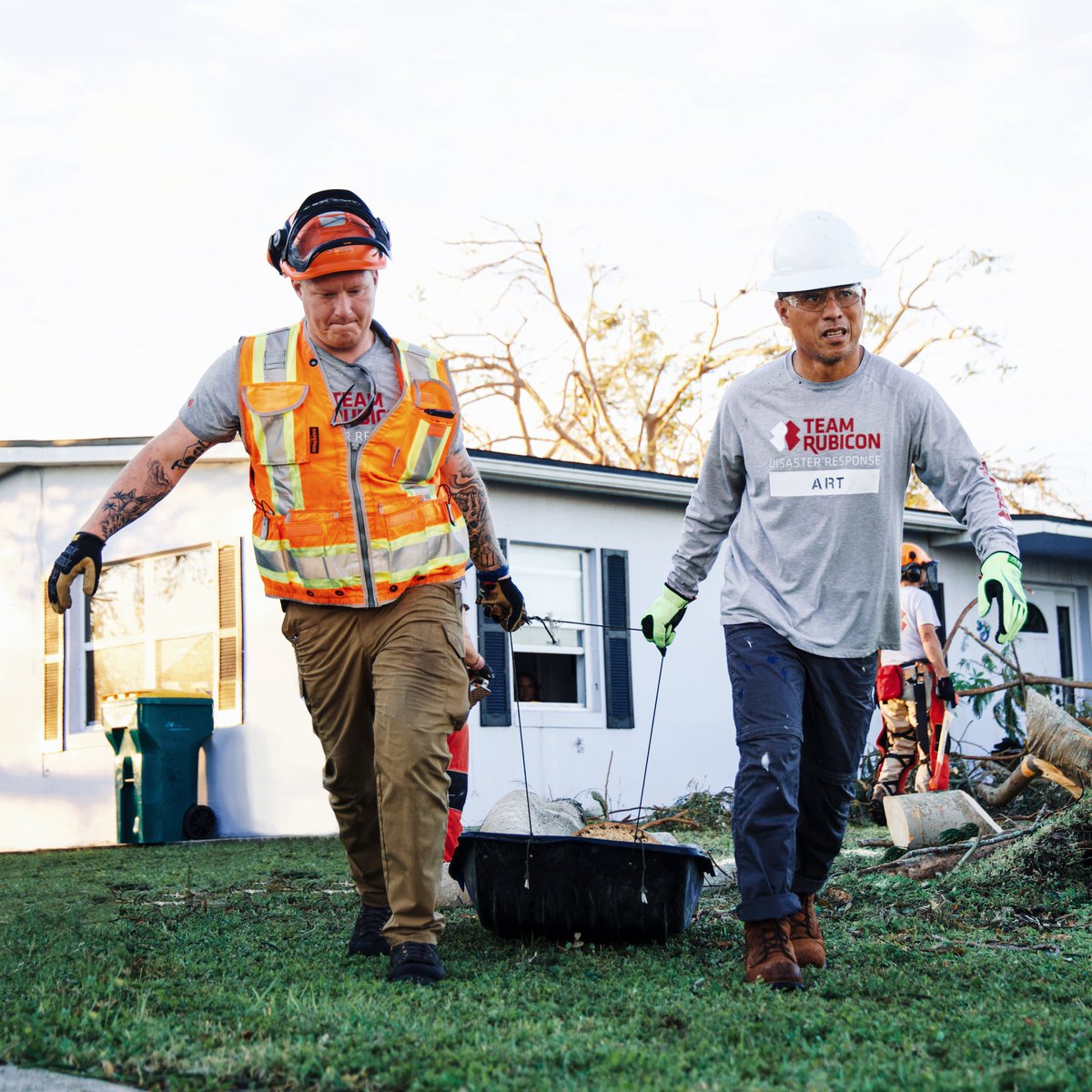 TeamRubicon's tweet photo. Florida: we've got your six. Along with route clearance, Greyshirts are now conducting core operations in Charlotte County, FL. And we'll soon start responding in hard hit Lee County. Waves of Greyshirts have answered the call and are headed to the Sunshine state ready to serve. https://t.co/f5mBwfP8Ad