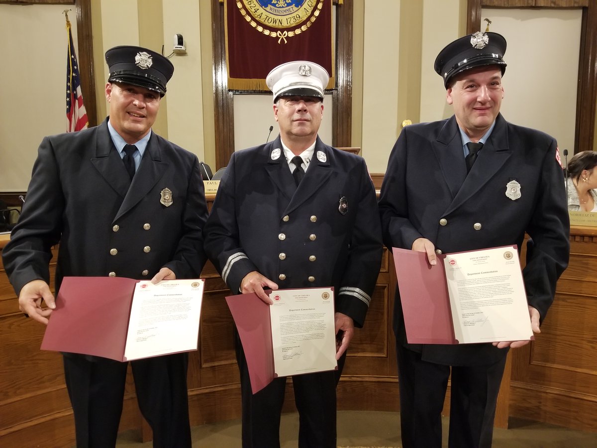 paulkoolloian1's tweet photo. Chelsea Fire Dept. Capt. Michael Gurska  Firefighters  Cristian Avellaneda and Steven Waxman received a Departmental Commendation for saving the life of a trapped occupant from the third floor during a 4 Alarm fire  on August 17, 2022 at 32-34 Cottage Street. https://t.co/s0NRF3DO7H