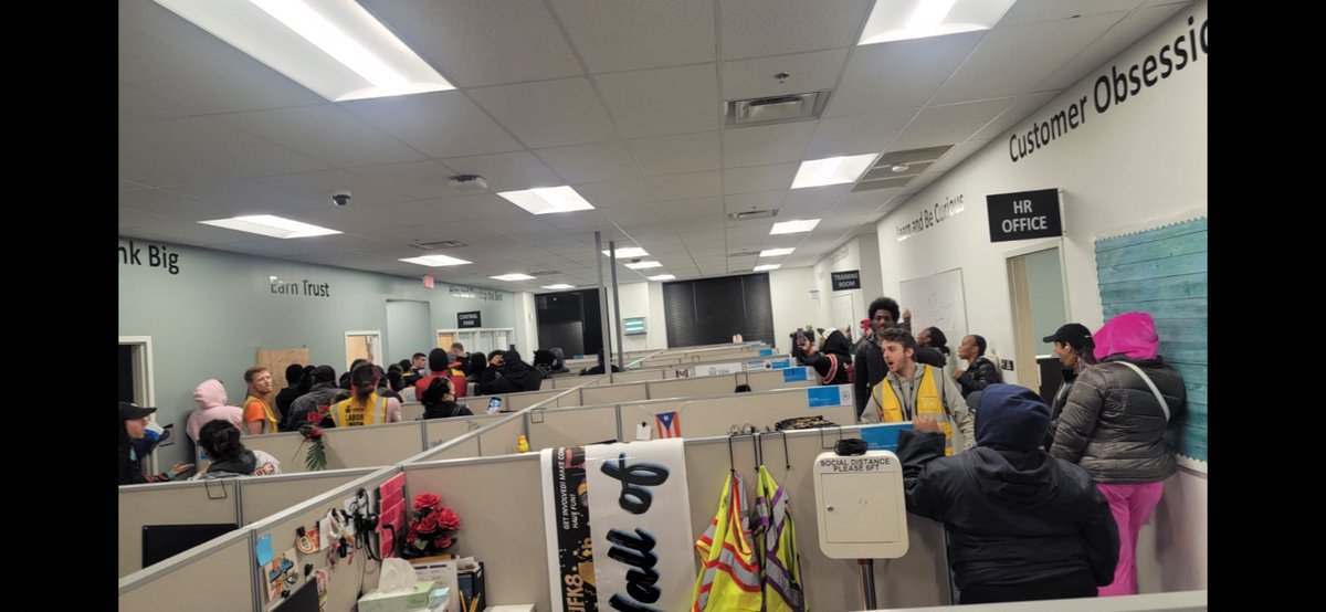 IssaSmallsWorld's tweet photo. Close to a hundred brave Workers occupied the Manager’s and HR’s office during the sit down strike demanding to be sent home with pay immediately. After Amazon played dumb, Workers walked out of JFK8 in disgust. https://t.co/7RwgTJFIze