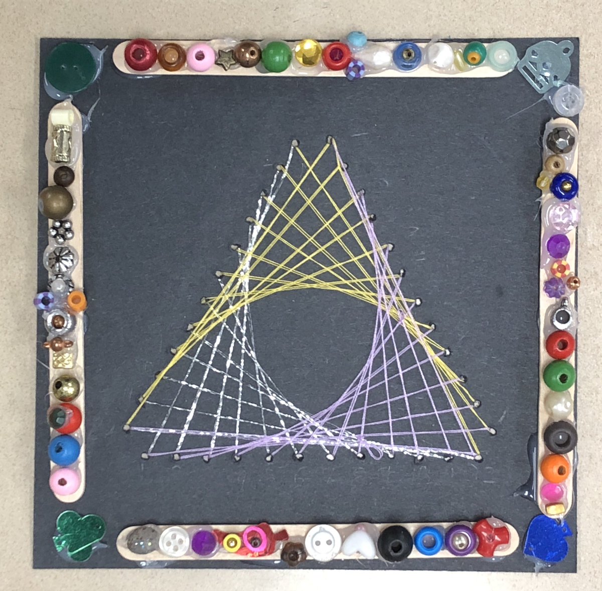carney_dana's tweet photo. G5 sts blending the worlds of math & art w parabola sewing. How can creativity transform our initial skills & ideas? What kinds of decisions do artists need to make when displaying their artworks for audiences? #arted #sasedu @SAmericanSchool #transdisciplinarylearning https://t.co/yCCrBCfuIz