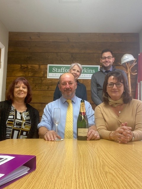 SP_Ashford's tweet photo. Celebrating our 6th anniversary with a bottle of bubbly. Still enjoying ourselves working hard and helping our clients get the most from their commercial property in #Ashford.  (We should perhaps point out that we all had a glass, not just Richard!) https://t.co/HBOZHBb74V