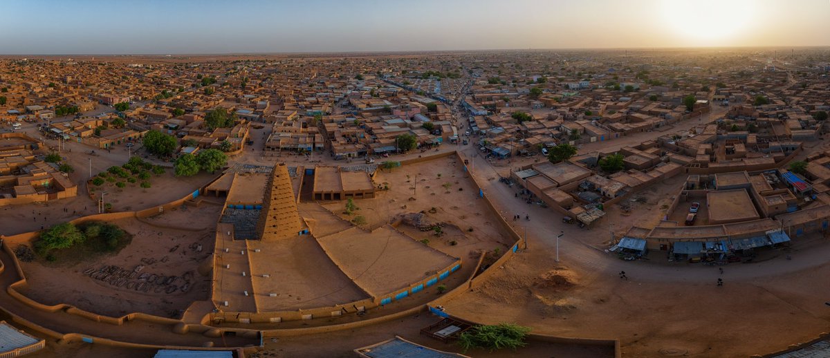 An aerial panoramic view of the Grand Mosque in Agadez, Niger, built from clay, it’s the tallest mud-brick structure in the world.