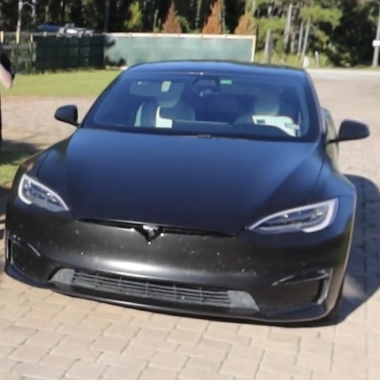 dreamgaminglive's tweet photo. Sapnap and his matte black tesla is such a hot combination i am so in love. https://t.co/XoqBakid7B