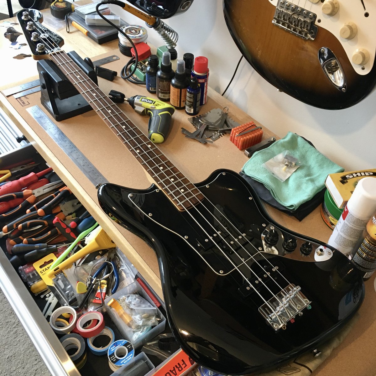 guitarbath's tweet photo. A @fender Squier Affinity Series Jaguar Bass on the bench for a full service/setup, deep clean and fret polish. #squier #jaguarbass #squierjaguar #affinityseries #fender #bassguitar #blackfinish #guitarservice #guitarsetup #guitarmaintenance #fretpolish #guitarbath https://t.co/bzwIhI5BaQ
