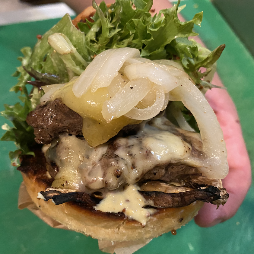 CongregationAle's tweet image. Trappist Style RibEye Burger- now part of our daily menu (and HAPPY HOUR lunches starting Wednesday at participating locations!) A double patty version of our classic w Trappist Chimay Cheese, Portobello, grilled onions, and greens w truffle vinaigrette