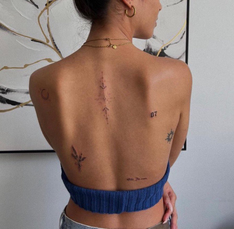 10 Dainty And Minimalist Back Tattoo Designs You Wont Regret