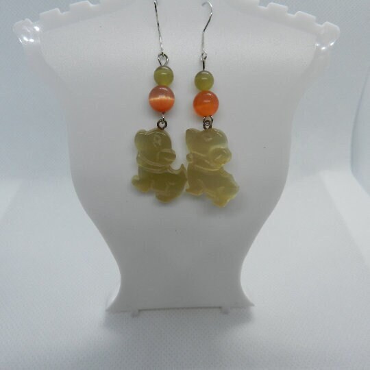 JnGifts's tweet photo. Beaded Carved Dog Earrings Dangle Pierced  E112 Ready to Ship https://t.co/aBoCOdk1dZ #JnJGiftsHandmade #Etsy #GiftsForHer https://t.co/n2M3T469EH