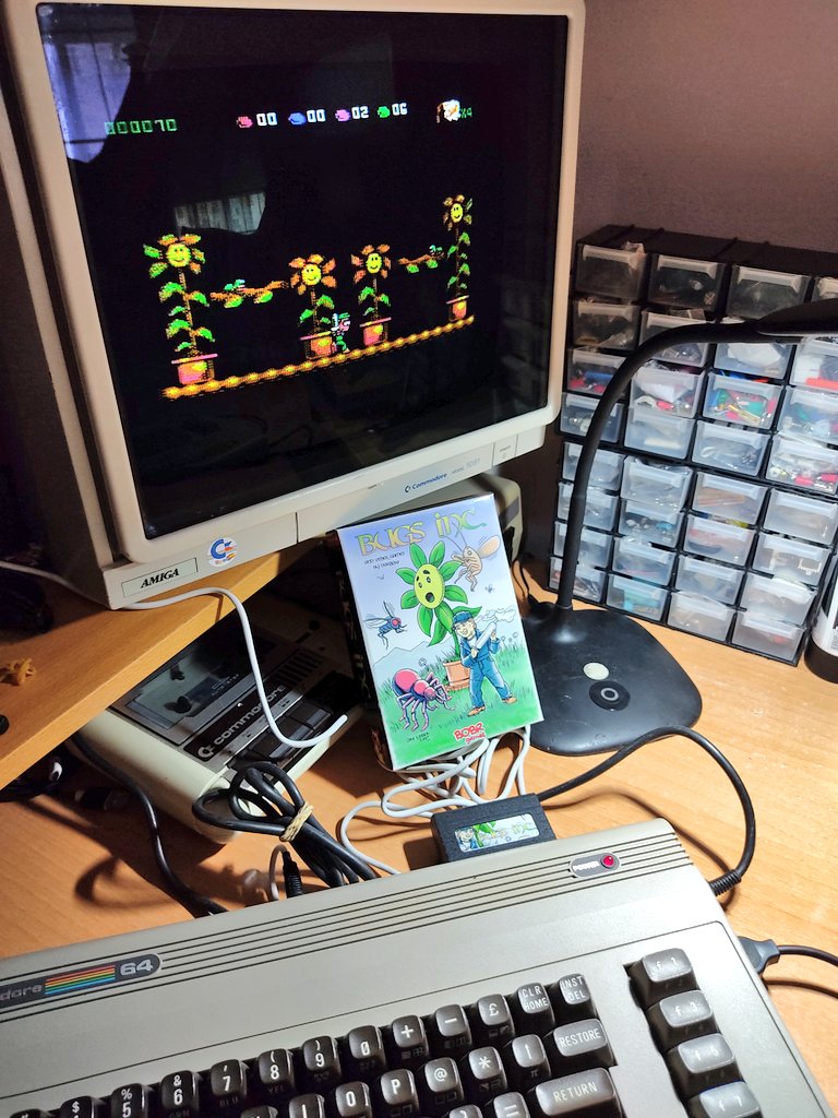 CommodoreSpain's tweet photo. ¡¡Qué preciosidad!! 😍 Por fin tengo en mis manos el último trabajo de @darro99 en su formato físico (cartucho) gracias a @Bobr_Games. (https://t.co/3LW8C3edFJ)  Es simplemente espectacular. ¡¡Bravo!! 👏👏 #BugsInc y ahora a jugar y disfrutar 😊!! #Commodore #C64 https://t.co/ErfzPTNHrO