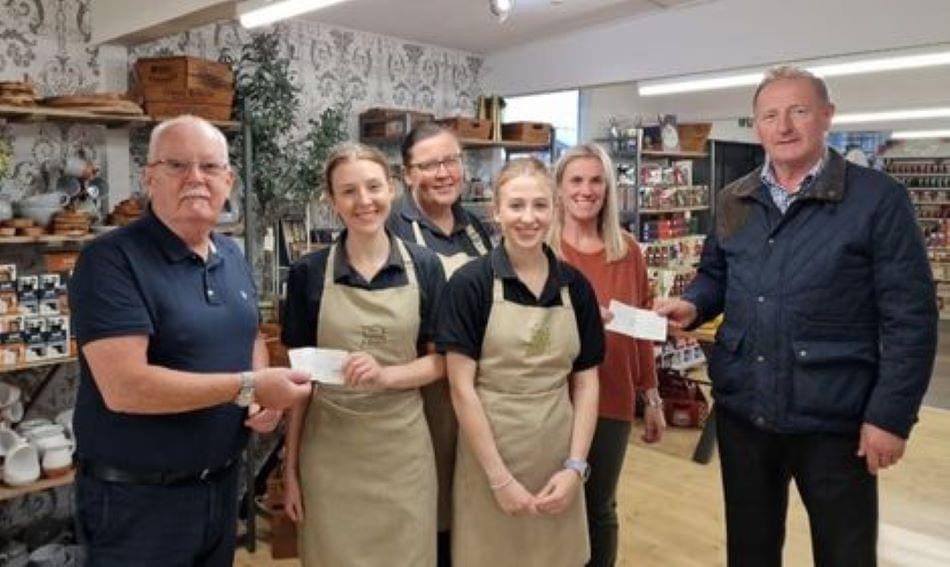 SteveOverthrow's tweet photo. Stephen Barrow of Basingwerk Lodge No.3753 &amp; Alun Andrew of Pennant Lodge No.7384 presented £250 &amp; £100 to Staff at Jacksons Garden Centre, Trelawnyd for the charity run up 'Gop Hill' raising £3,000 for Ty Gobaith Children's 
#Freemsons https://t.co/aFoiCPReIl