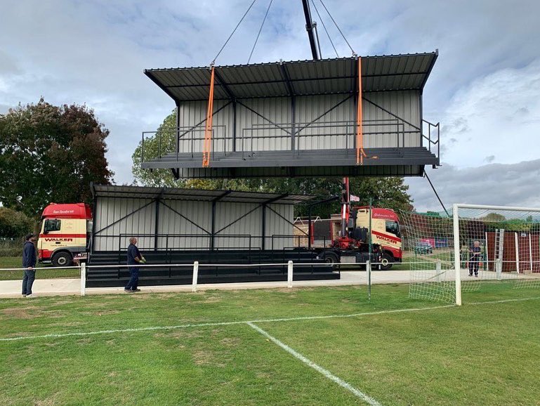 nptfc's tweet photo. 😍 Steve Dart Terrace in place 😍

Wow! What a day. After lots of amazing fundraising, donations and hard work, the Steve Dart Terrace has today been installed into Willen Road.

Thankyou all so much for helping to make this happen, for such a worthy cause. 

💚🤍 🦢🤍💚 https://t.co/QMbWWvoFeC