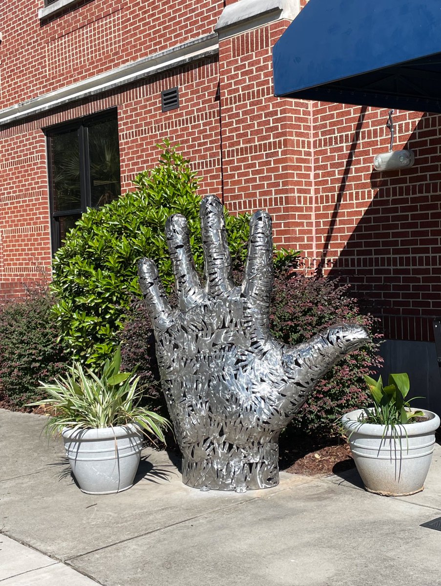 DocPTG's tweet photo. The world will now see we are Hand MS, R1! Under the artistic direction of Mr. Bob Doster, our students created this awesome piece, SY21-22.TY Mr. Doster for leaving a lasting handprint on our lives! #ABCSchool #Grateful @HandMiddleSC @RichlandOne https://t.co/hLefrDMpiI