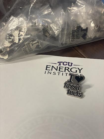TCUEnergy's tweet photo. I have started settling into-glowing up my office at The RLEI, and I happened upon this bag of pins hiding in the bottom of a drawer. #energymba #EnergyTransition #energyagnostic #andnotorapproach https://t.co/LyTCmp4hWt