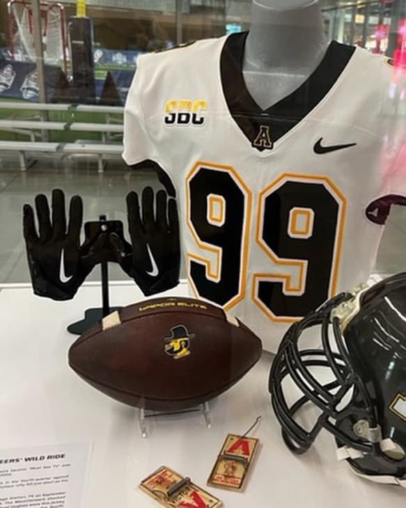 GWHSFootball1's tweet photo. Former @GWHSFootball1 player @MichaelLeeHugh1 recently had his jersey displayed in the College Football Hall of Fame after @AppState_FB win over Texas A&amp;M. https://t.co/tPMLwt7H3O