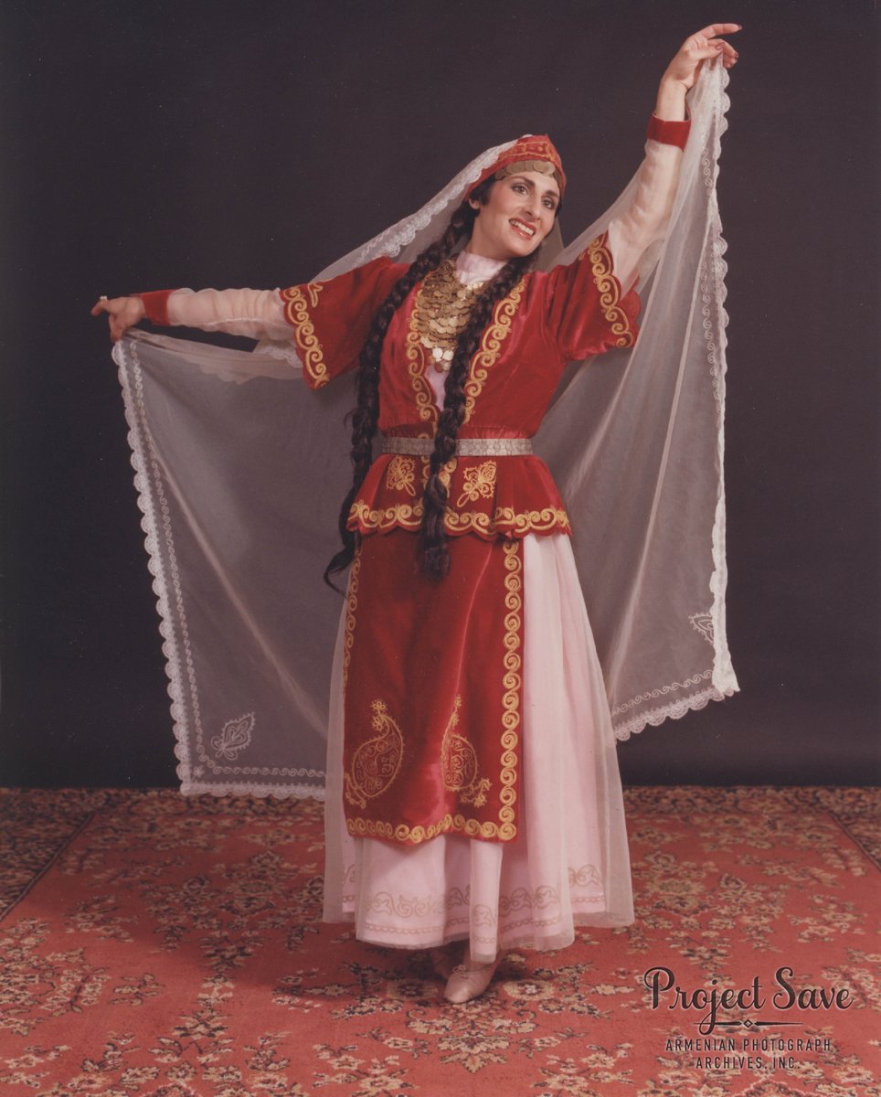 Susan Eramian Ounjian poses in the costume wore at the Moscow State Dance Exhibition, where it won a gold medal, 1974; photo by Michael Ounjian, her husband. 

#folkdance #embroidery #Armenia #PhotoArchive