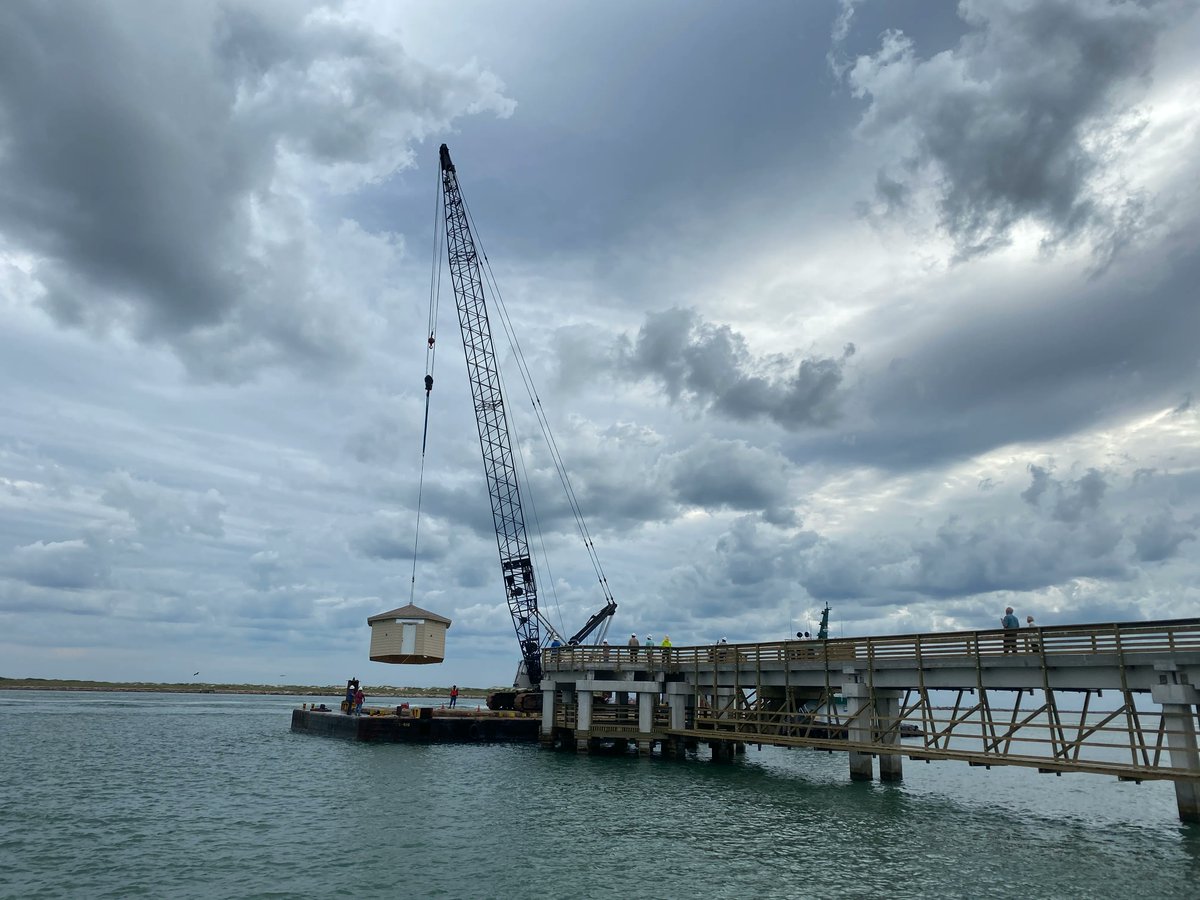 One crane closer - the instrument house was placed on the end of the #UTMSI research pier this morning. The pier helps our scientists sample water, flora and fauna in the Aransas Pass Ship Channel - the connection between the Gulf of  Mexico and local bay systems. #TexasScience