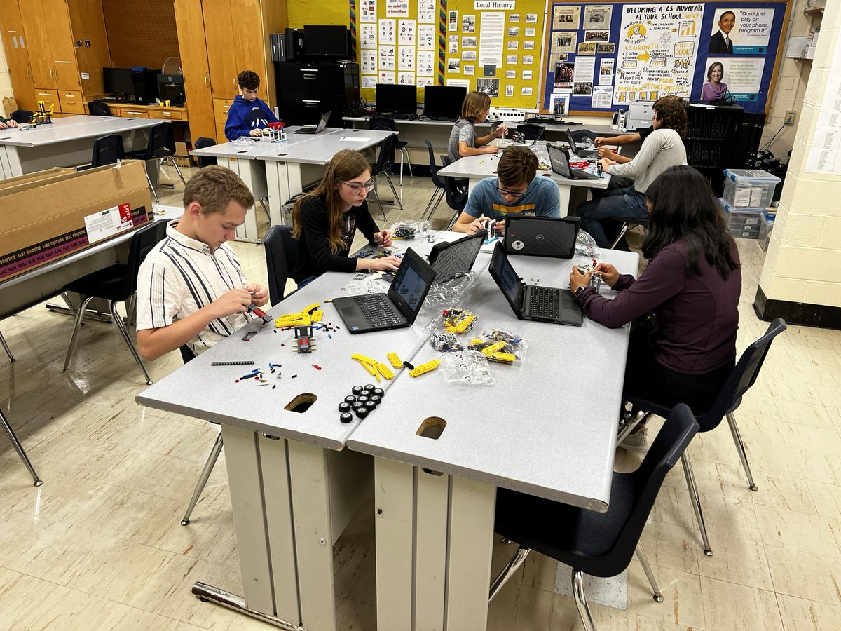 Robotics students working hard building Lego kits for the FLL event we are going to host next month!!