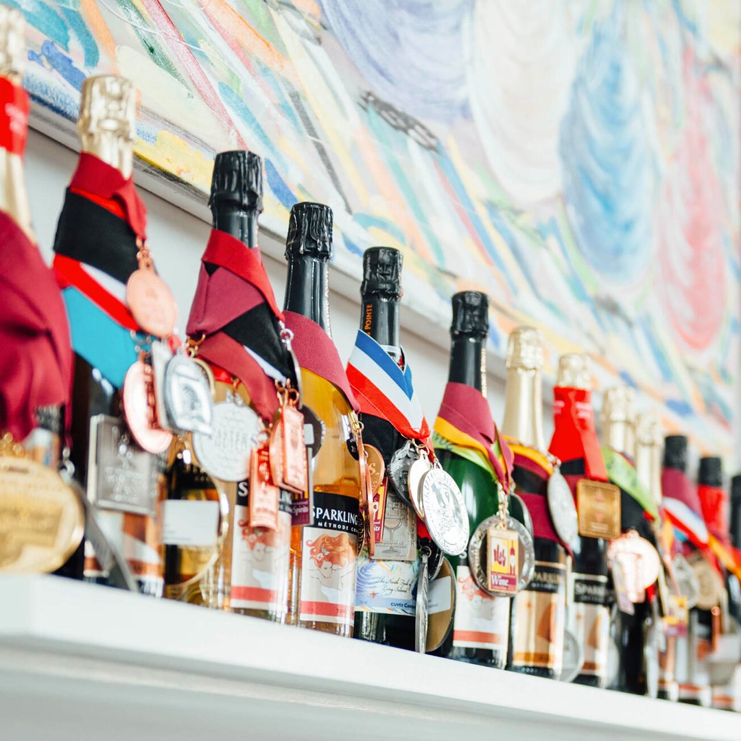 Nestled in the breezy and beautiful North Fork of Long Island, GWDB Pro Member’s Cynthia and Tom Rosicki have dedicated Sparkling Pointe Vineyards and Winery to estate grown sparkling wines produced exclusively in the traditional Méthode Champenoise. <a href="/SparklingPointe/">Sparkling Pointe</a>